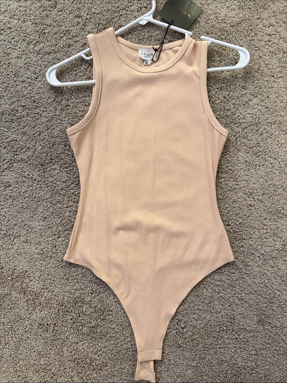 Le Lis Sleeveless Ribbed Bodysuit in Nude Beige